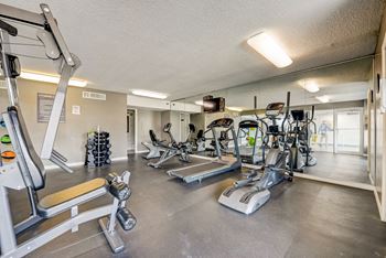 24-Hour fitness center w/ cardio equipment & free weights